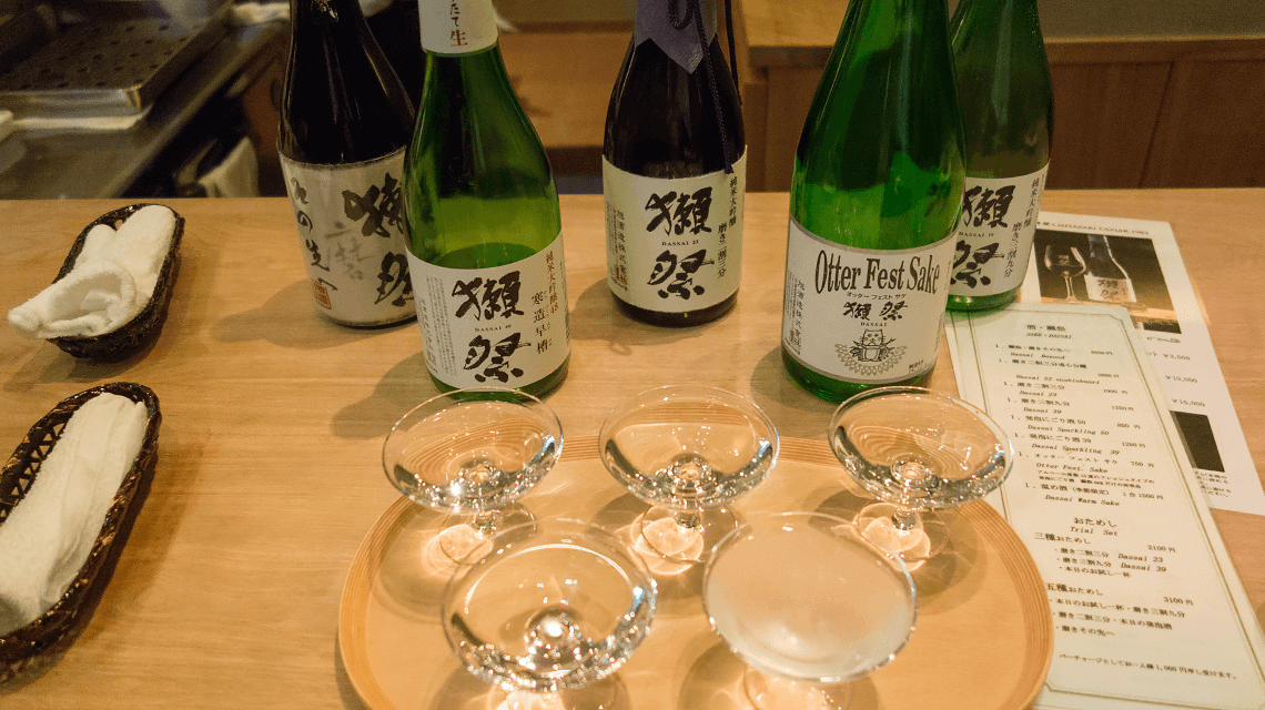 Sake tasting at an izakaya in Tokyo, Japan Sake tasting at an izakaya in Tokyo, Japan