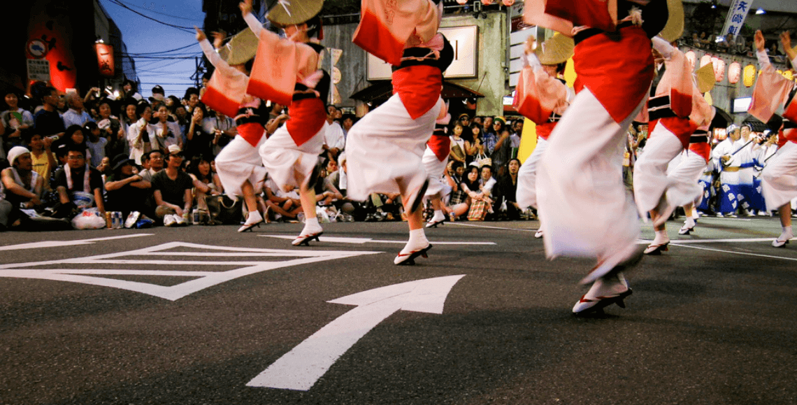 At the Awa Odori festival. Attending a matsuri is one of our top 5 things to do in Japan