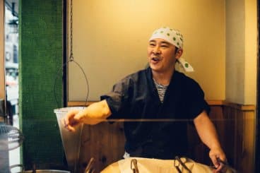 Man preparing food in Kyoto Japan