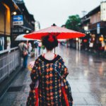 Geisha Maiko in colorful kimono in Gion district of Kyoto, Japan